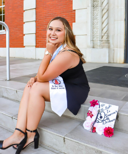 Avery Alva poses ahead of graduation