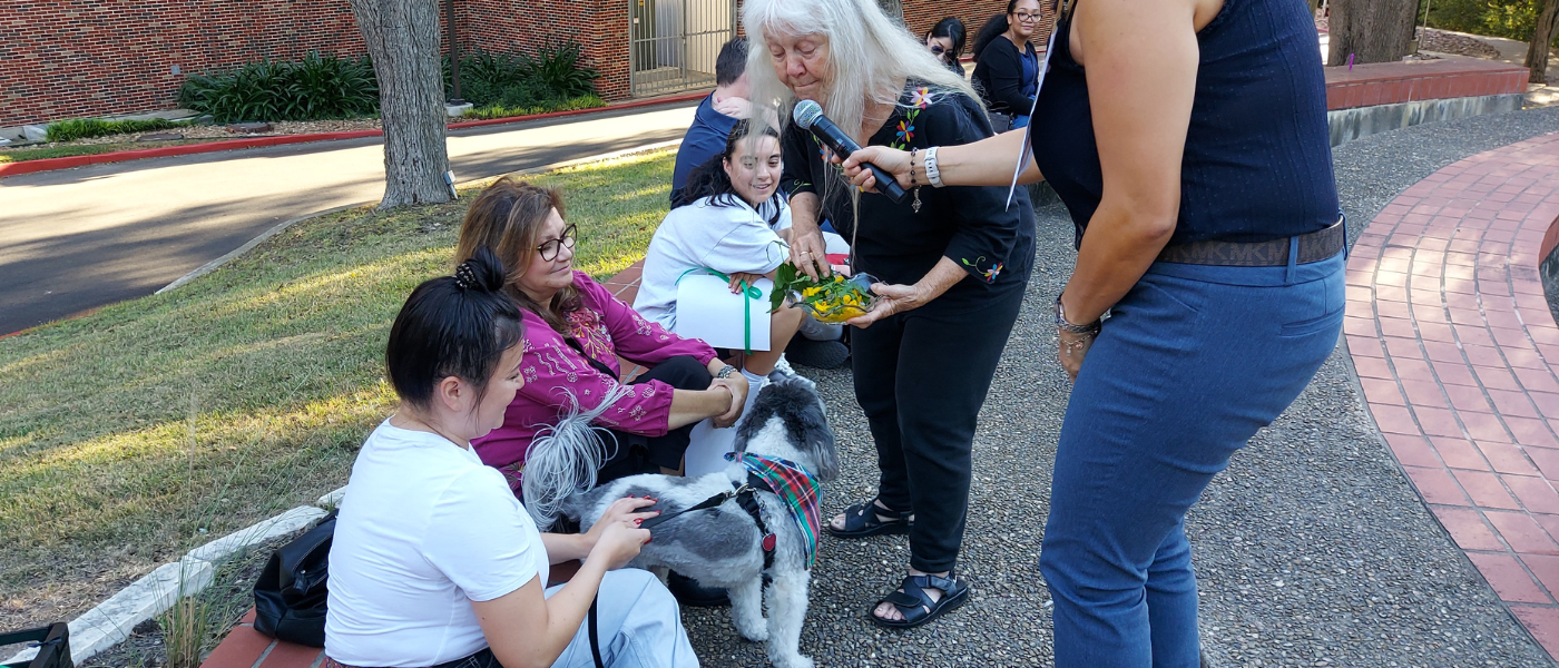 Sister Martha Ann blessing a dog