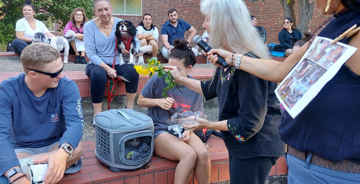 Sister Martha Ann Kirk blessing a cat