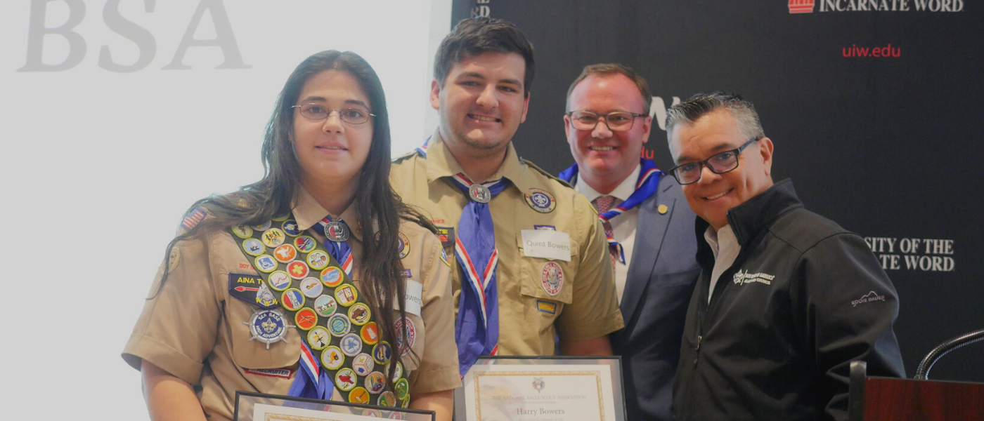 (left-right) Scouts Elizabeth Ann Bowers, Harry Bowers, Dr. Thomas M. Evans, and Michael de los Santos 