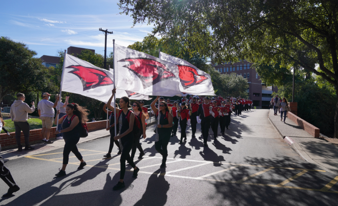 The UIW Marching Band performs before a football game