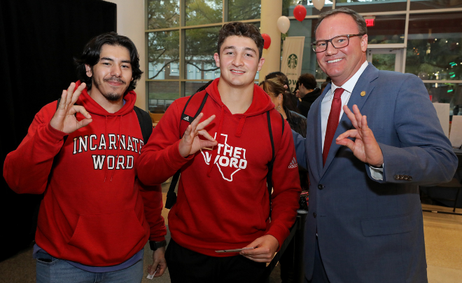 Two UIW students and Dr. Thomas M. Evans, PhD
