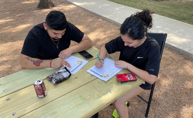 Students working at a picnic table