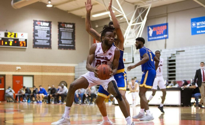 Godsgift "GG" Ezedinma playing basketball at UIW