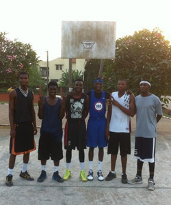Godsgift "GG" Ezedinma and a group of friends on the basketball court in Nigeria