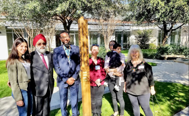 Social Justice Leadership students, G.P. Singh and Sister Martha Ann Kirk 