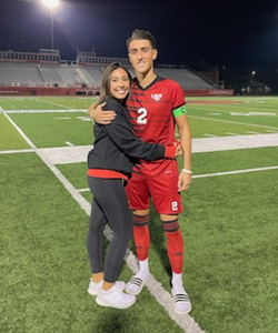 Lars Willems hugs Lauren Mancha after soccer game