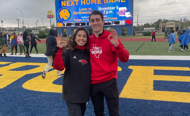 Lauren Mancha (left) and Lars Willems (right) on a football field