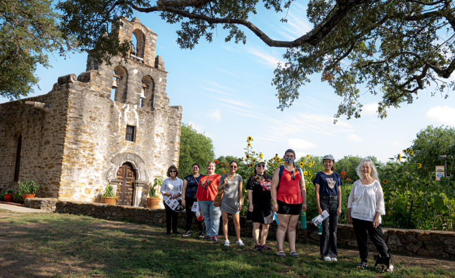 A group from the UIW community in front of the Mission San Francisco de la Espada