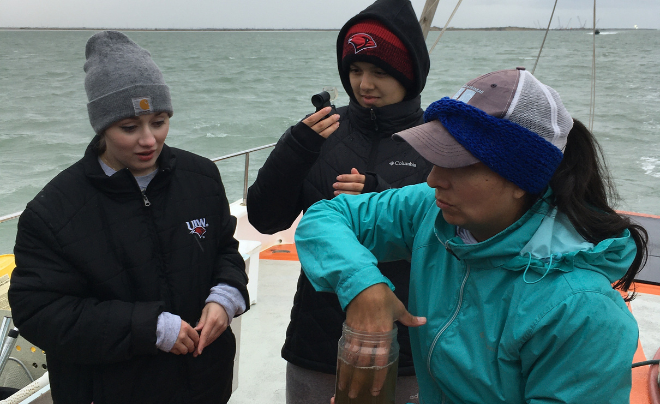 Three women on research boat