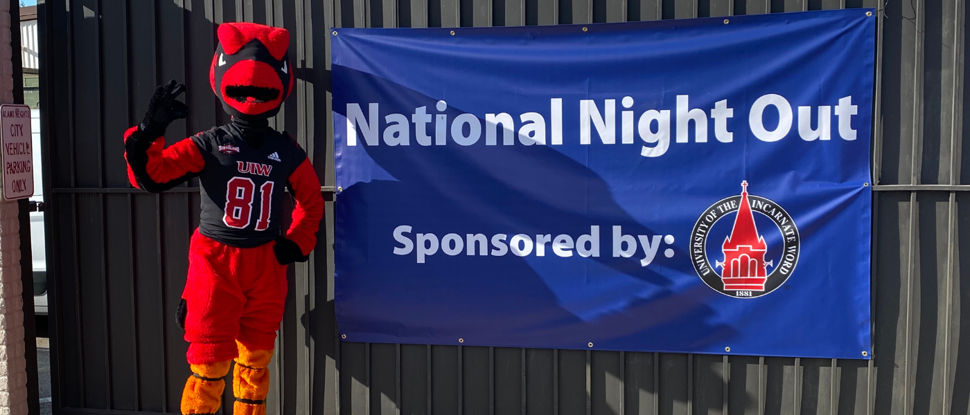 Red in front of the National Night Out banner
