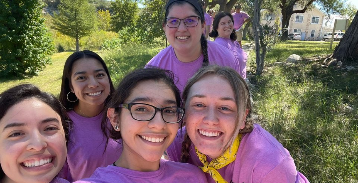 Five students take a group selfie at the Salve Retreat