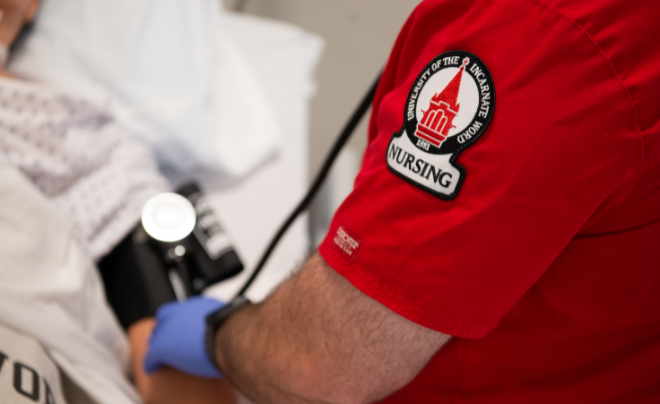 UIW nursing patch on red nursing sleeve