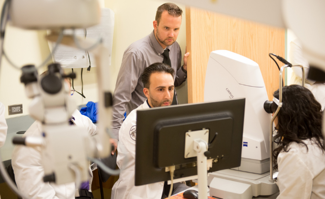 Members of UIWRSO perform an eye exam