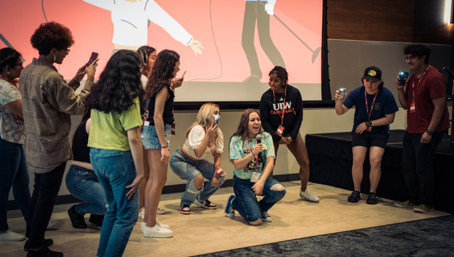 Students singing at summer Orientation