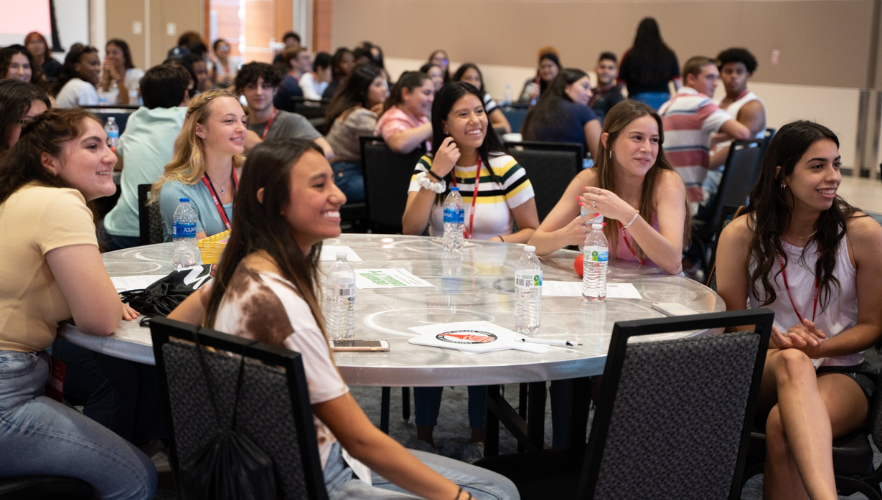 Students smiling at summer orientation 