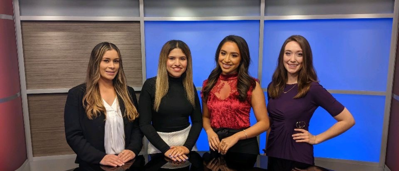 UIWtv students pose on set