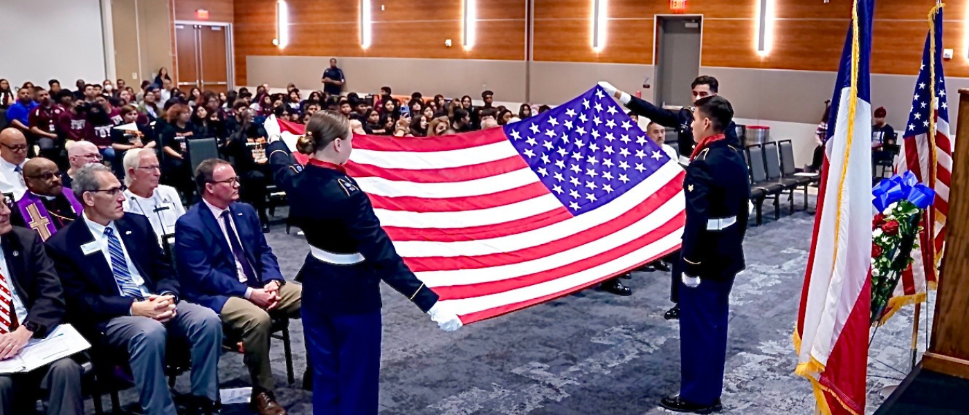 ROTC members fold a U.S. flag