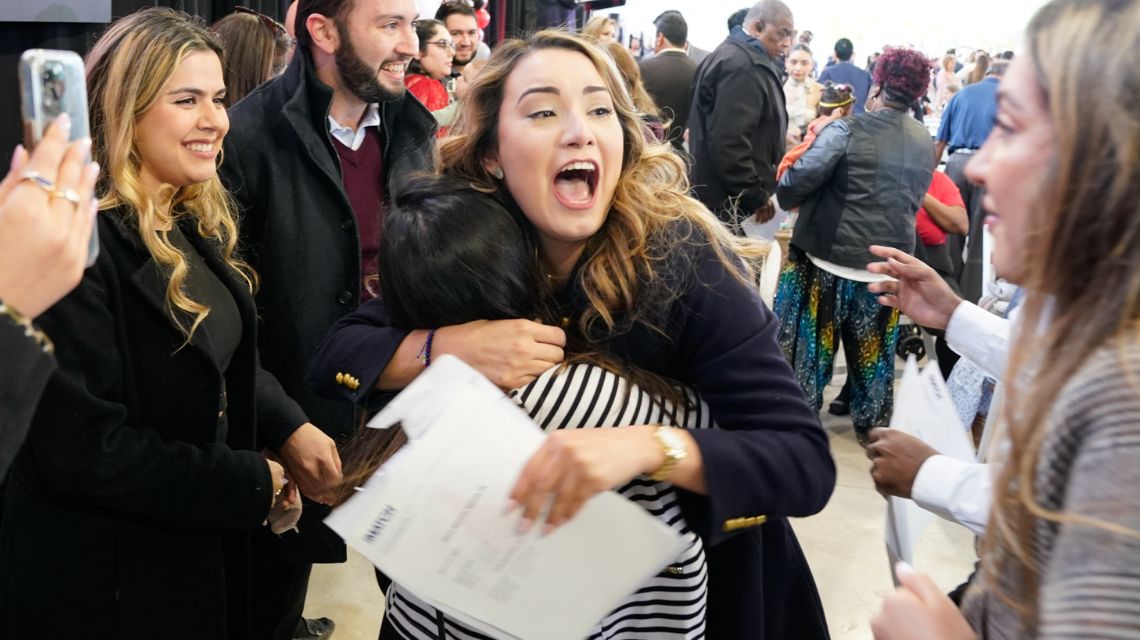 Two women celebrating