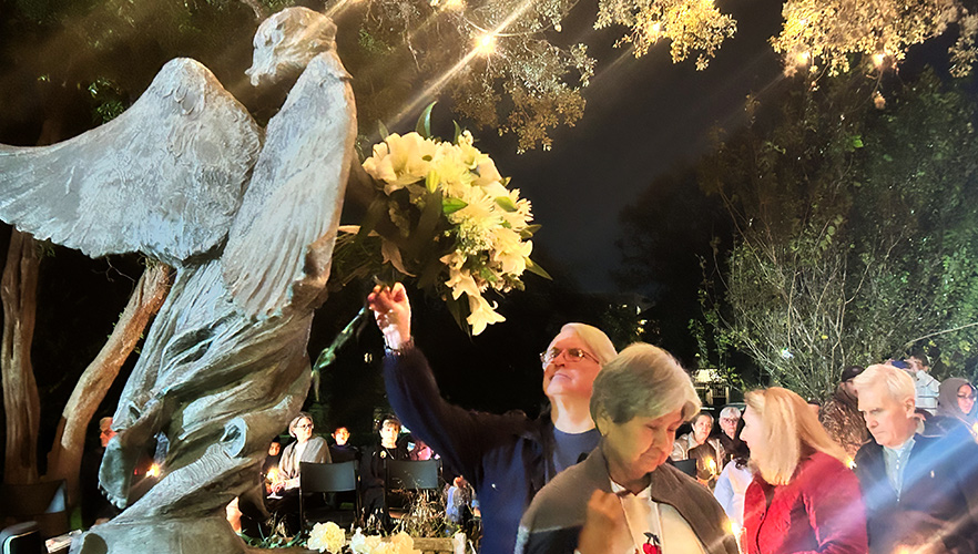 Praying at Angel of Hope statue