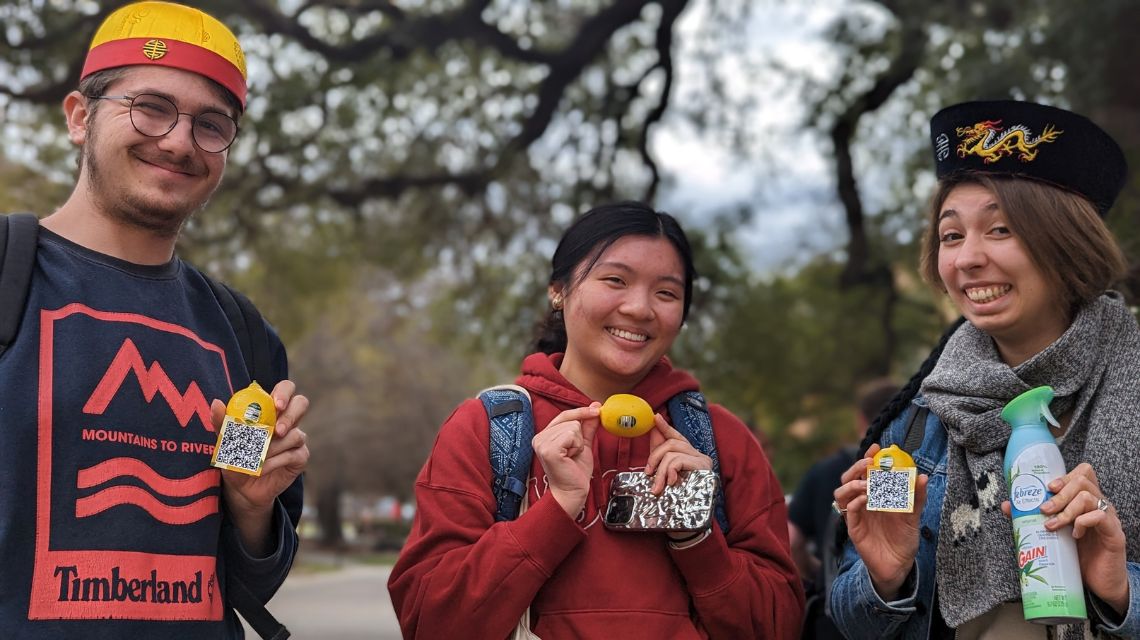 Students showing the lemons they received during Asian New Year