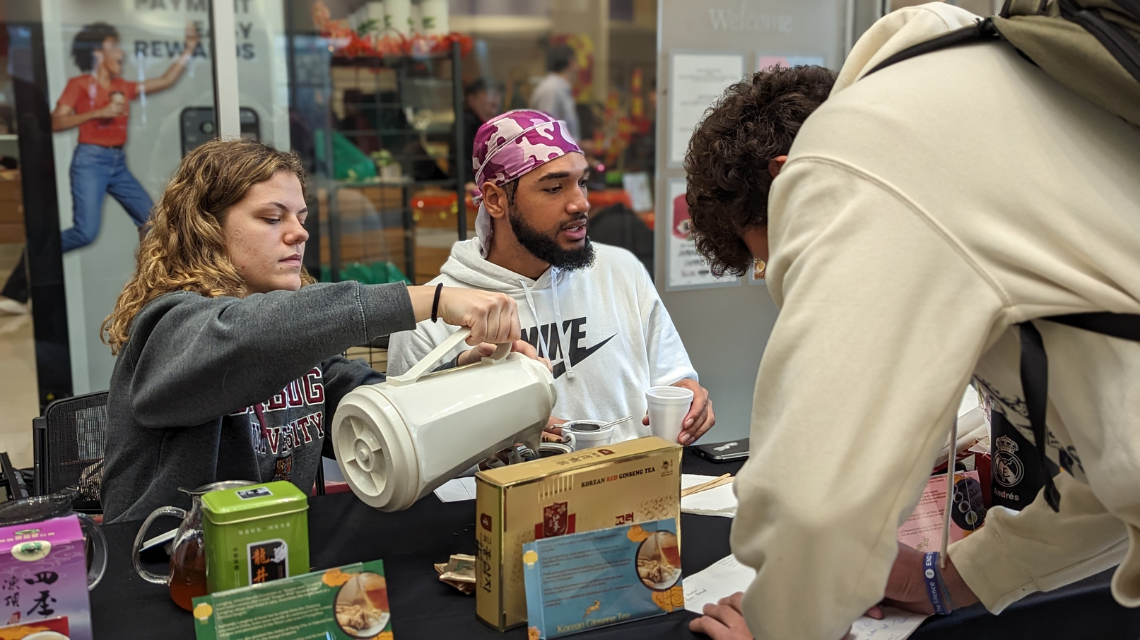 Person pouring tea 