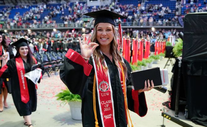 Student in graduation cap and gown