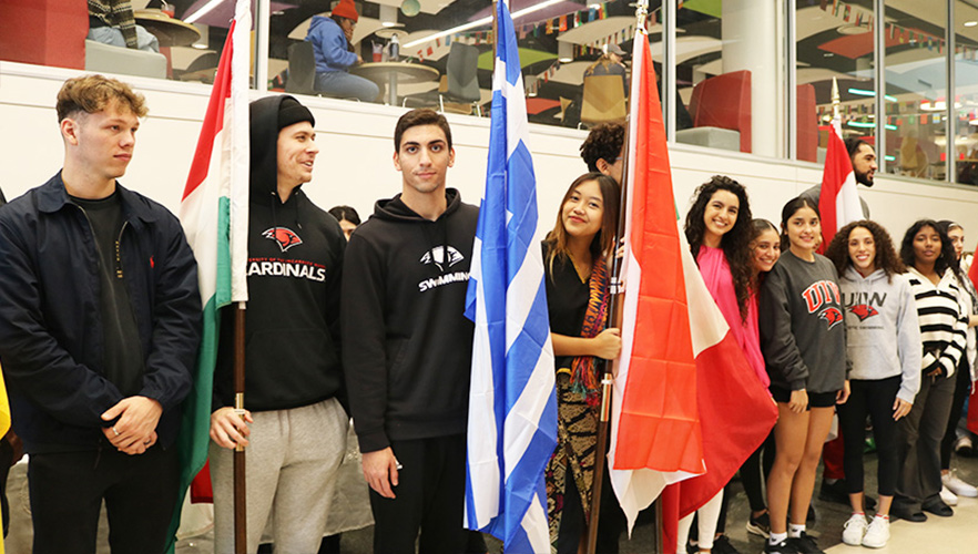 Students holding flags