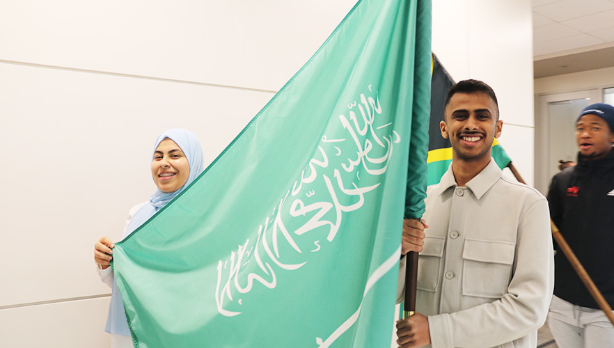 International students folding flag