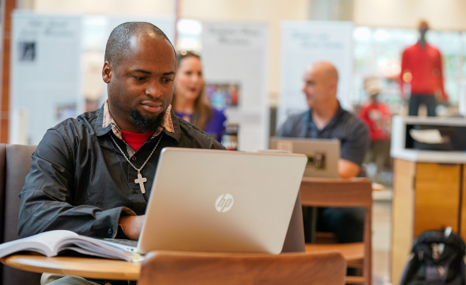 Student studying on laptop