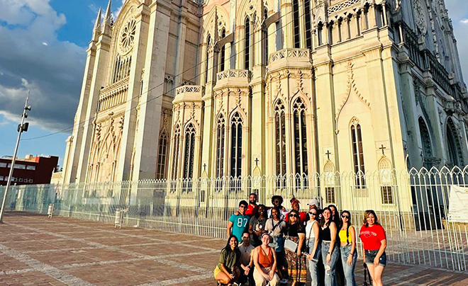 students in front of chapel