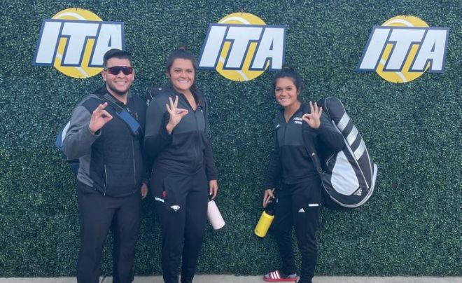 Dr. Edgardo Rivera Lopez with two tennis student-athletes