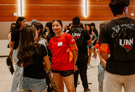 two students at event