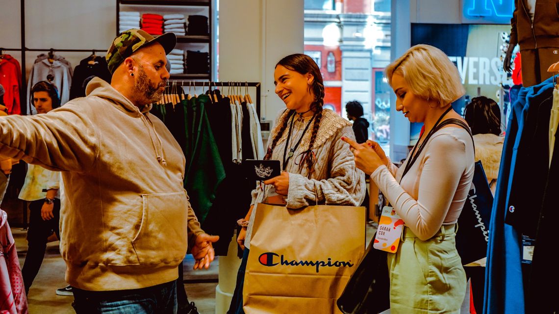 Sarah Cox talking to people at NYFW