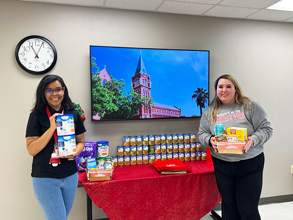 SPS Student Helps in Food Drive