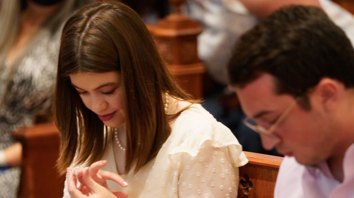 Student looking at a ring