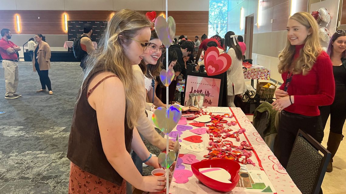 Students looking at one of the booths