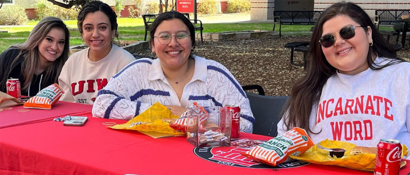 students having a snack at a table