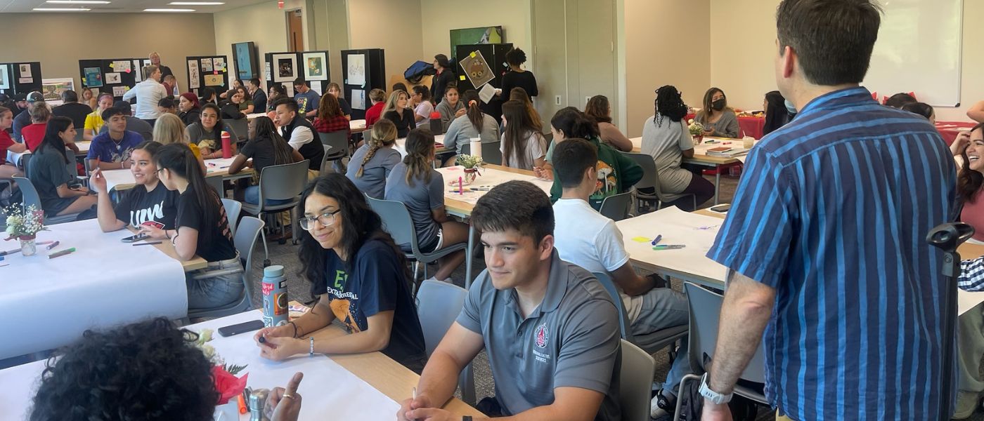 Students working at tables