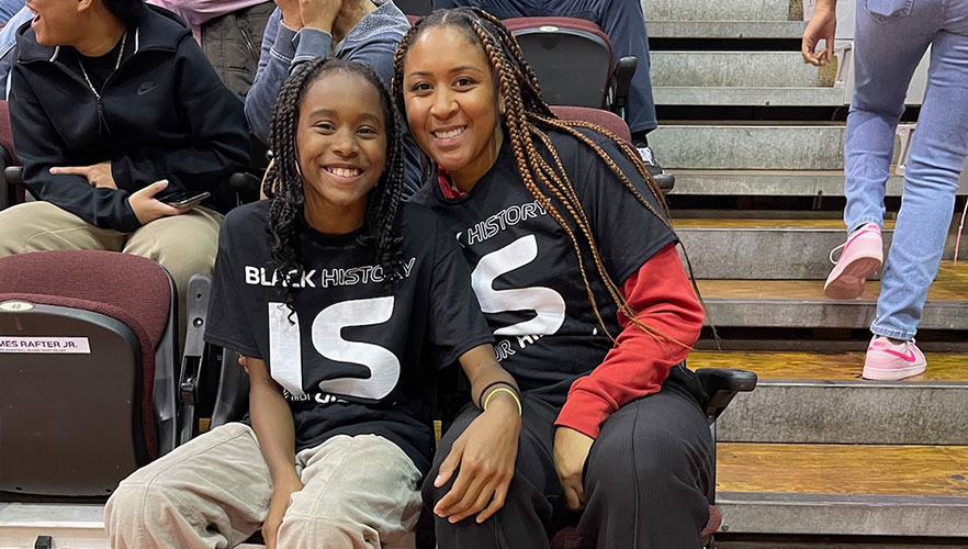 People in Black Out for Black History shirts