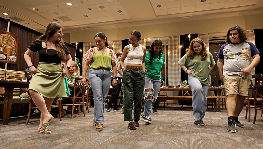 Attendees dancing