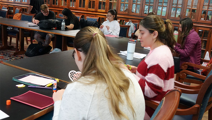 Students creating Valentine's Day cards