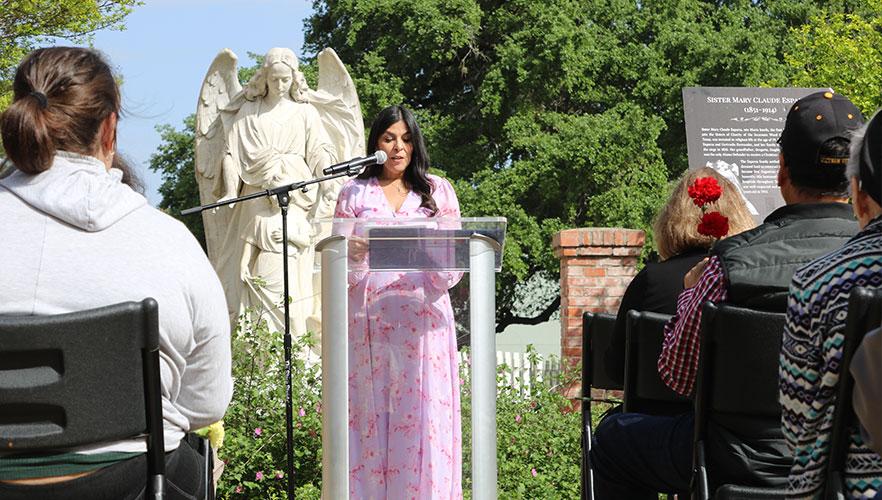 Dr. Erika Haskins speaking