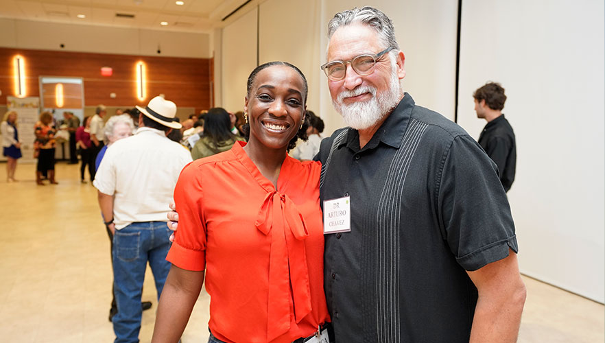 Dr. Chavez with event attendee