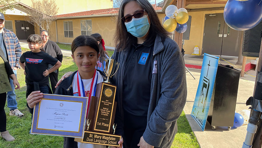 St. Mary Magdalen student with trophy