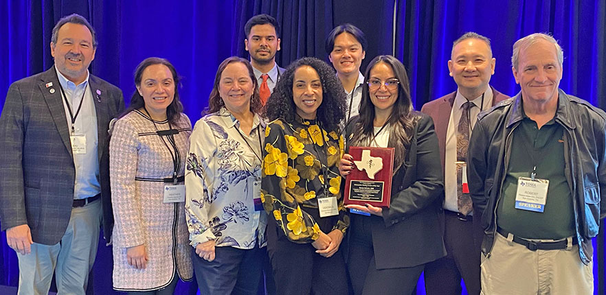 Dr. Vera receiving recognition