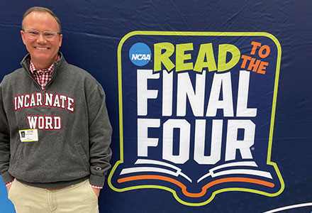 Dr. Evans at "Read to the Final Four" event