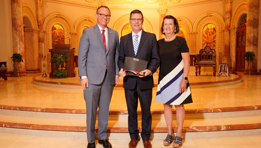 Dr. David Maize with Dr. Thomas M. Evans and Suzanne Goudge