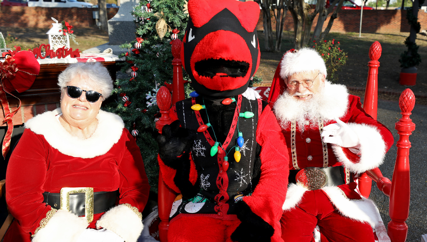 Red the Cardinal with Santa and Mrs. Claus