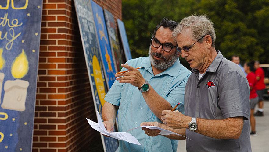 Judges judging display boards